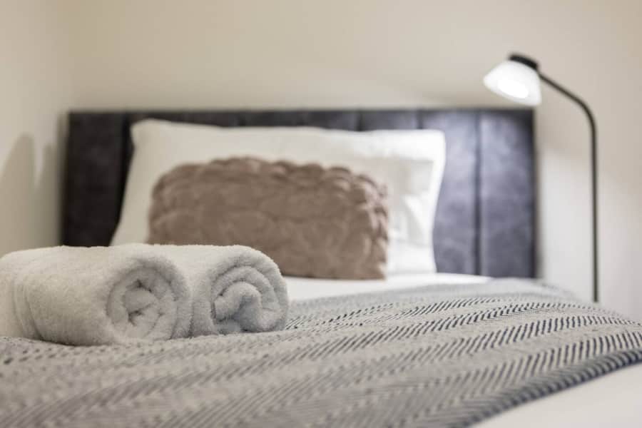 Prepared king bed in Apartment 2